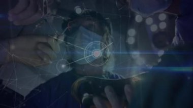 Animation of network of connections over team of diverse surgeons during operation. Health, medicine, connections, network and technology concept digitally generated video.