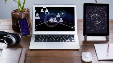 Animation of network of connections with icons over office. Global business and digital interface concept digitally generated video.