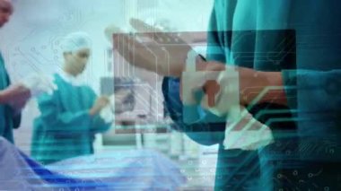 Animation of data processing over mid section of male surgeon wearing surgical gloves at hospital. Medical healthcare and technology concept