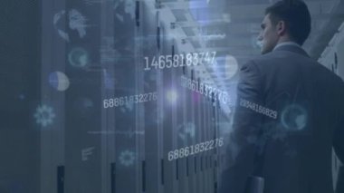 Animation of data processing over caucasian businessman in server room. Global technology, online security and digital interface concept digitally generated video.