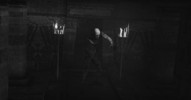 Image of scary zombie mummy walking in dark crypt with burning torches, in black and white. Halloween fear, horror and suspense concept digitally generated image.