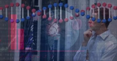 Animation of data processing and dna strand over caucasian male worker in server room. Global technology and digital interface concept digitally generated video.