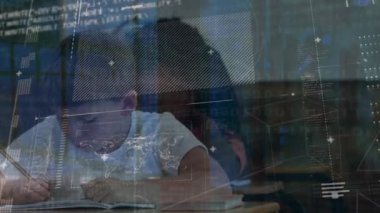 Animation of interface with data processing over caucasian boy studying in the class at school. School and education technology concept