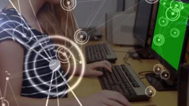 Animation of network of connections over caucasian woman using computer with copy space. Global networking and business technology concept