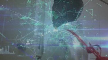 Animation of network of connections over afro american schoolboy in the school. Global technology digital interface and connections concept digitally generated video.