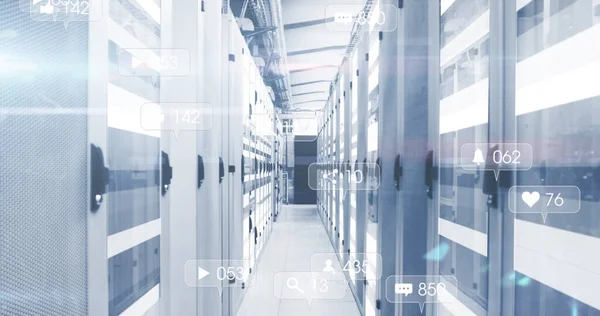 Image of social media icons and numbers and data processing over computer servers. Global social media, computing, data processing and digital interface concept digitally generated image.