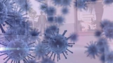 Animation of virus cells over african american man. Global covid 19 pandemic and digital interface concept digitally generated video.