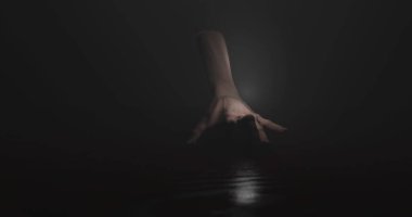Image of hand walking in dark space. Horror, fright and halloween concept digitally generated image.