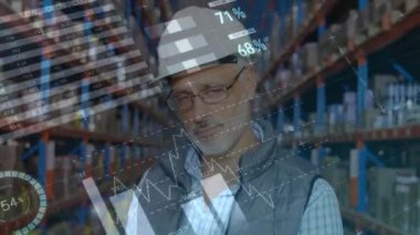 Animation of statistical data processing over caucasian senior male supervisor smiling at warehouse. Logistics business and technology concept