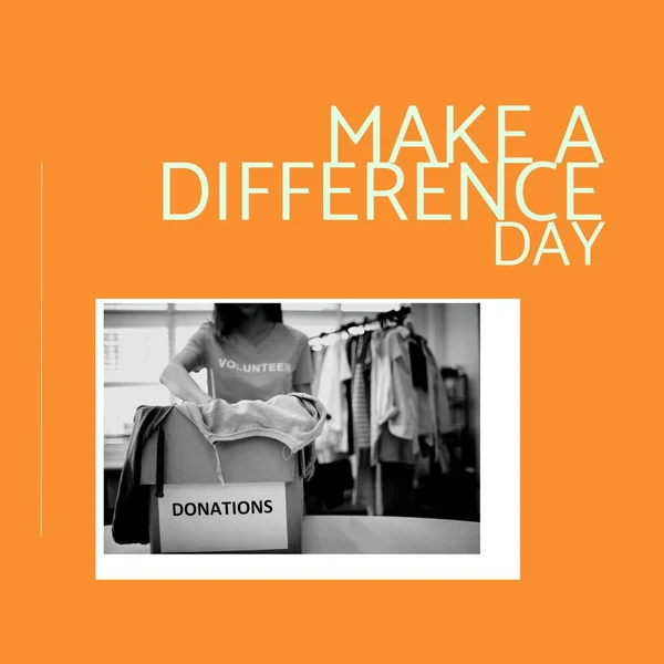 Composition of make a difference day text over female volunteer with donation box. Make a difference day and celebration concept digitally generated image.