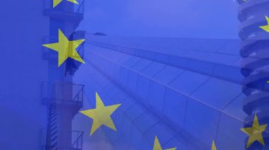 Composite video of european union flag waving against tall buildings. European union and business concept