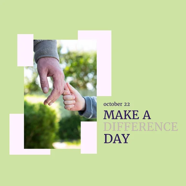 Composition of make a difference day text over holding hands. Make a difference day and celebration concept digitally generated image.