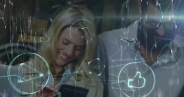 Animation of digital icons and network of connections over office colleagues using smartphones. Global networking and business technology concept