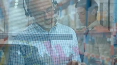 Animation of statistical data processing over caucasian senior male supervisor using digital tablet. Logistics business and technology concept