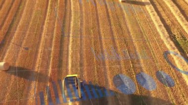 Animation of statistical data processing over aerial view of tractor operating in farm fields. Global business and agriculture concept