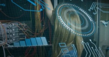 Animation of round scanner and data processing over caucasian female engineer working at server room. Computer interface and business data storage technology concept