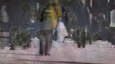 Animation of virus cells over asian woman sneezing and diverse people on street. Global covid 19 pandemic and digital interface concept digitally generated video.
