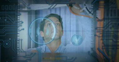 Animation of round scanner and data processing over caucasian male engineer working at server room. Computer interface and business data storage technology concept