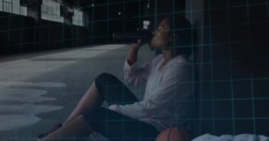 Animation of scope scanning and data processing over african american woman at gym. Global business, data processing and digital interface concept digitally generated video.
