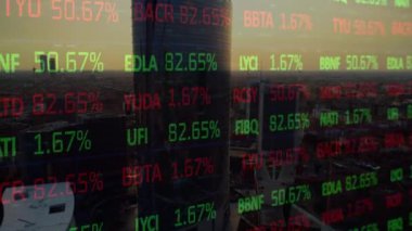 Animation of trading board moving over aerial view modern cityscape against sky during sunset. Digital composite, multiple exposure, investment, finance, skyscraper, database concept.