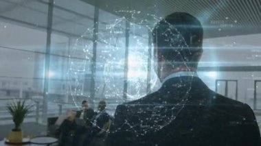 Animation of globe with network of connections and data processing over business people. Global business, finance, networks and data processing concept digitally generated video.