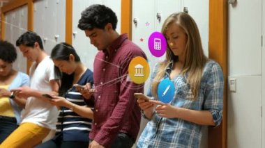 Animation of colorful icons and network of connections over diverse students using smartphones. Global social media, icons and digital interface concept digitally generated video.