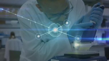 Animation of network of connections over caucasian male scientist. Global science, connections and networks concept digitally generated video.