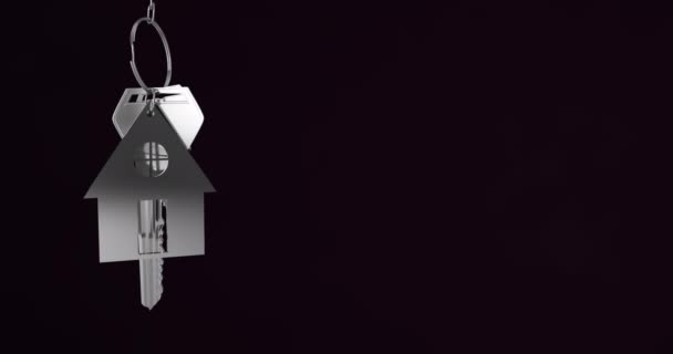 Animation Silver House Keys Hanging Black Background Copy Space Relocation — Stock videók