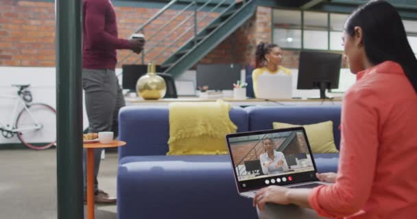 Animation Biracial Woman Having Video Call Laptop Business Communication Working — Vídeo de stock