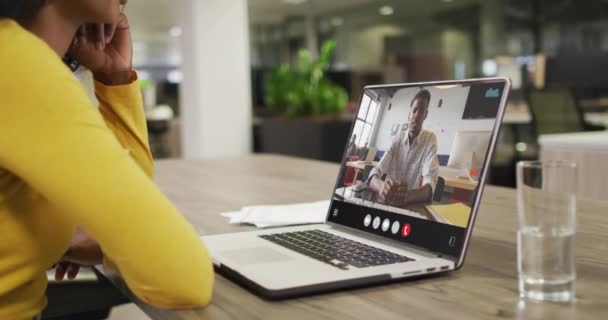 Animation Biracial Woman Having Video Call Laptop Business Communication Working — Vídeo de stock