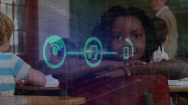 Animation of application icons and binary code over smiling african american girl in classroom. Digital composite, multiple exposure, coding, education, school, childhood and technology concept.