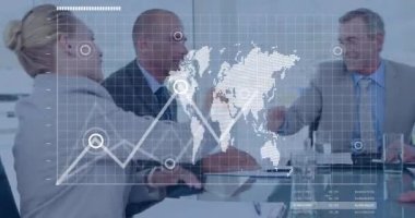 Animation of data processing over caucasian business people at meeting. Global business and digital interface concept digitally generated video.