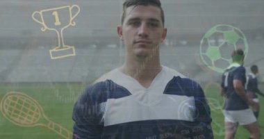 Animation of digital interface with covid medical data processing over rugby players. Sport fitness and active lifestyle concept digitally generated video.