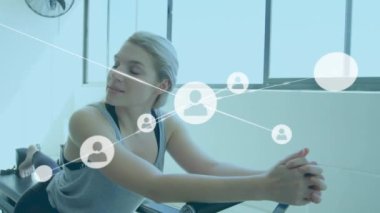 Animation of network of connections over businesswoman wearing vr headset. Global connections technology and digital interface concept digitally generated video.