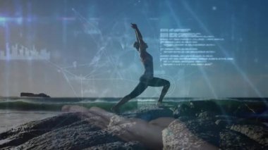 Animation of digital globe and icons connecting with lines over woman meditating on rocky beach. Digital composite, multiple exposure, nature, globalization, networking, zen, exercise, fitness.