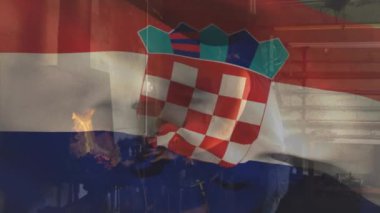 Animation of flag of croatia waving over caucasian man wearing face mask in data processing. Healthcare and medical concept.