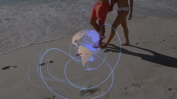Animation Globe Rotating Wave Pattern Low Section Caucasian Couple Walking — Stock Video