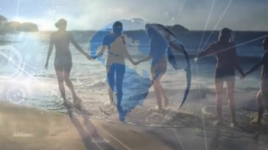 Animation of globe rotating with connected dots over female friends holding hands and walking in sea. Digital composite, multiple exposure, global network, together, nature, vacation, enjoyment.
