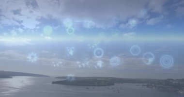 Animation of network of connections with icons over cityscape. Global digital interface technology and networking concept digitally generated video.