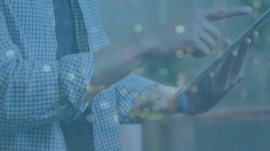 Animation of man using smartphone over man using smartphone. Global connections technology and digital interface concept digitally generated video.