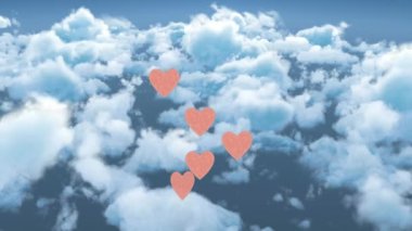 Animation of colourful puzzle pieces forming hand over sky. Digital animation of follow like and heart icons increasing in numbers with sky background.