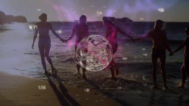 Animation of globe rotating with numbers over female friends holding hands and walking in sea. Digital composite, multiple exposure, global network, together, nature, vacation, enjoyment, glowing.