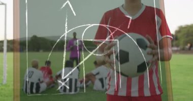 Animation of game plans over diverse football players. Global sport and digital interface concept digitally generated video.