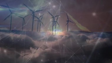 Animation of network of connections over spinning windmills against clouds in the sky. Global networking and renewable energy technology concept