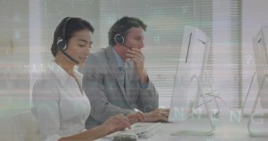 Animation of scanning, virus warning over caucasian female and male call center workers. Business, call center, finance, economy and working with technology concept digitally generated video.