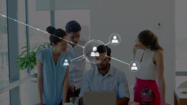 Animation of network of connections over caucasian business people in office. Global business and digital interface concept digitally generated video.