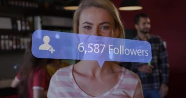 Animation of speech bubble with increasing followers over portrait of caucasian woman smiling at bar. Social media networking technology concept
