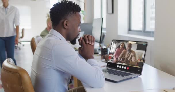 African American Man Using Laptop Video Call Diverse Business Colleagues — Wideo stockowe