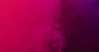 Video of white smoke with red light moving on black background. Halloween, autumn, tradition and celebration concept.