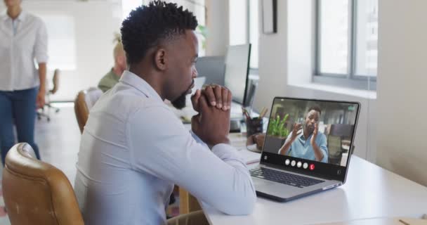 African American Man Using Laptop Video Call Business Colleague Screen — Stockvideo